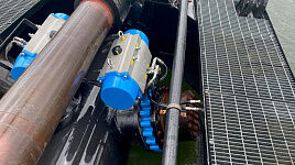 Actuator bar-agturn and butterfly valve on a ship at a harbour in the USA