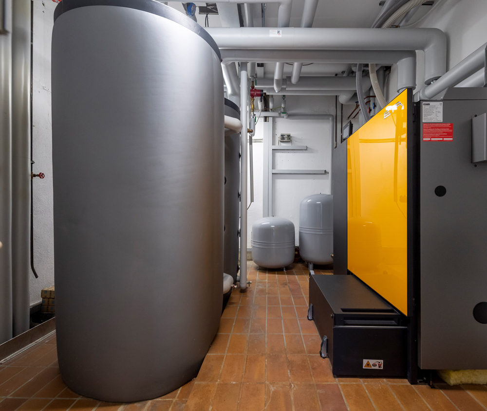 Golf club boiler room with pellet heating system.