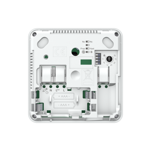 Thermostat d’ambiance filaire analogique Watts Heat&Cool WT-A03 HC PA, vue arrière présentant borniers de raccordement, logements pour piles AAA, micro-interrupteurs et molette de réglage.